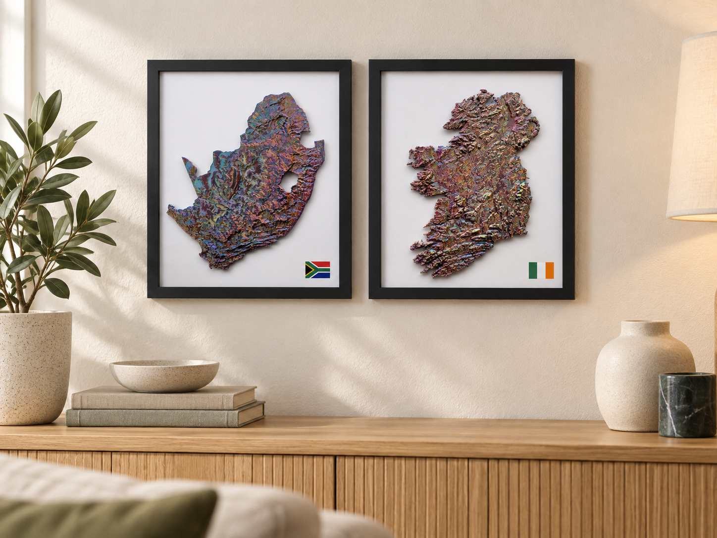Iridescent relief maps of South Africa and Ireland in black frames
