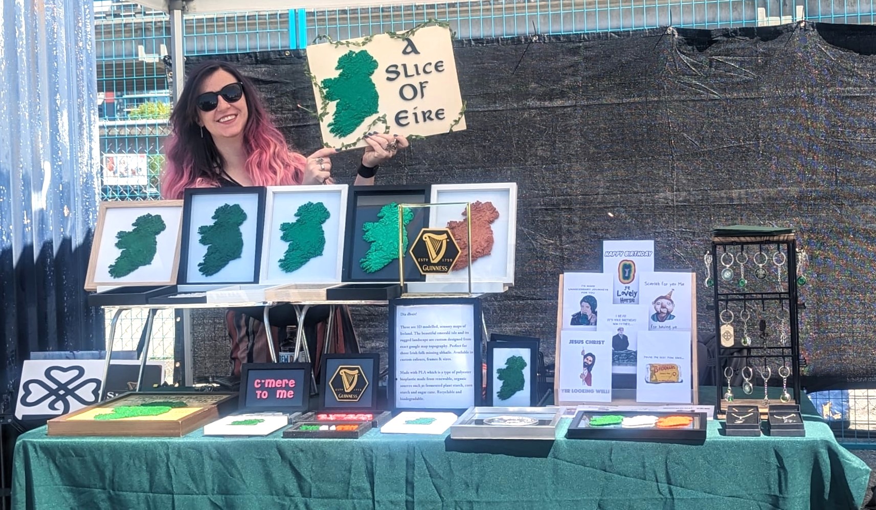 A Slice Of Éire market stall displaying framed 3D topographic maps of Ireland